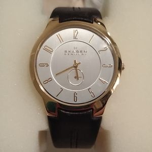 Woman's NWT SKAGEN DENMARK watch.  Gold & leather